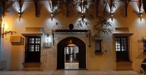 an entrance to a building with a door and windows at Hotel Del Virrey in Salta