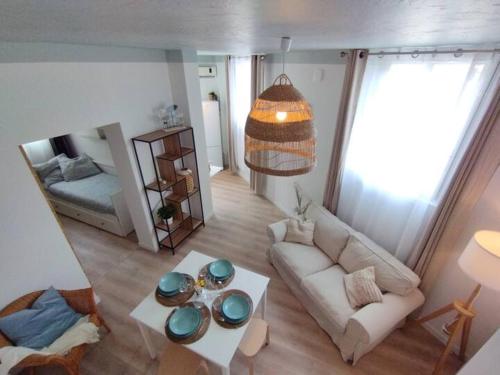 Coin salon dans l'établissement Cote Sable Ambiance bord de mer dans le centre