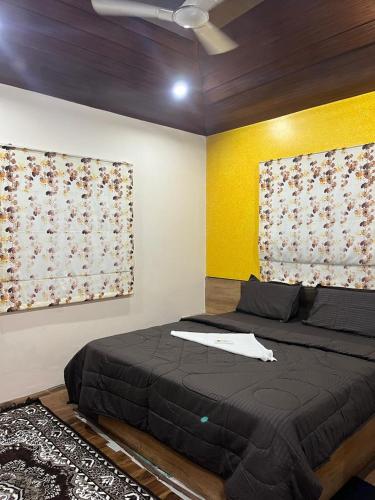 Ένα ή περισσότερα κρεβάτια σε δωμάτιο στο Lavin's villa