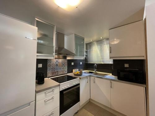 Kuchyň nebo kuchyňský kout v ubytování Lemon & Roses