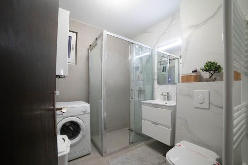 Foto Aurelio Centar Apartment with Balcony and Free parking 2