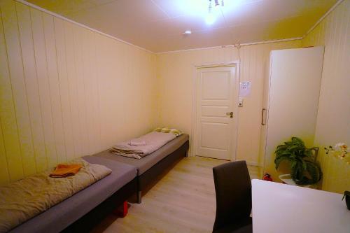 Katil atau katil-katil dalam bilik di Hage Rooms