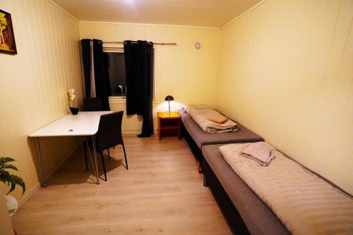 Llit o llits en una habitació de Hage Rooms