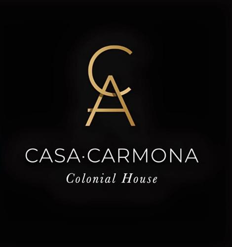 a logo for a colonial house with a letter csarmaarma colonial house at Hotel Casa Carmona in Querétaro