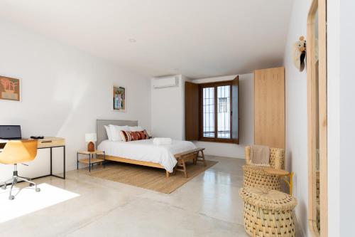 Ένα ή περισσότερα κρεβάτια σε δωμάτιο στο Outsite Oaxaca City - Work, Connect, Explore