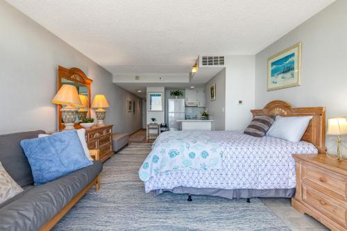 Ένα ή περισσότερα κρεβάτια σε δωμάτιο στο Golden Sands 1109