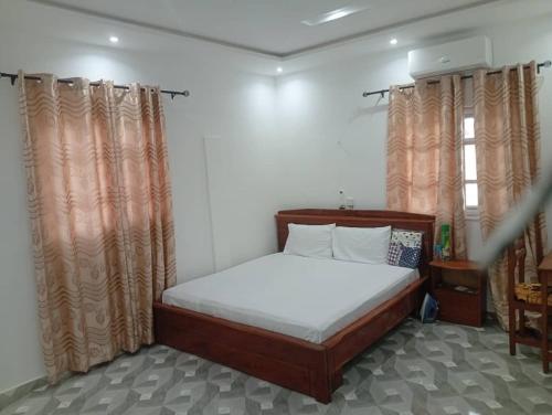 Ένα ή περισσότερα κρεβάτια σε δωμάτιο στο Fenou