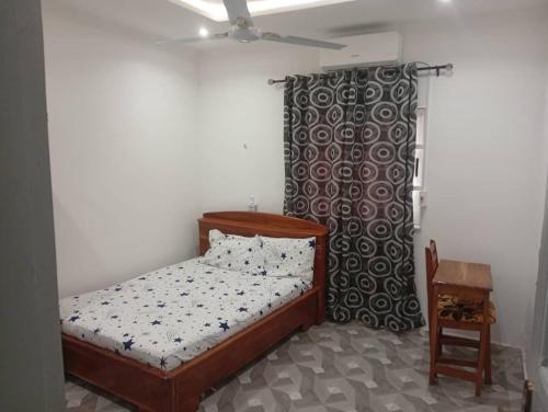 Ένα ή περισσότερα κρεβάτια σε δωμάτιο στο Fenou