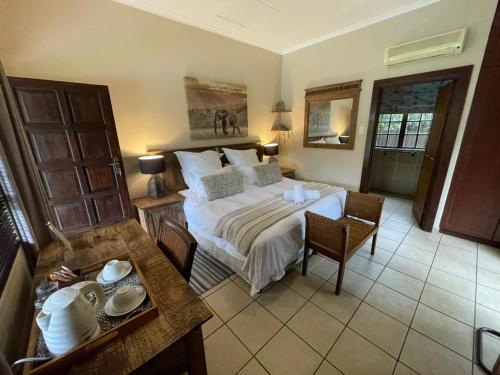 Postel nebo postele na pokoji v ubytování Afri-Lala Bed & Breakfast