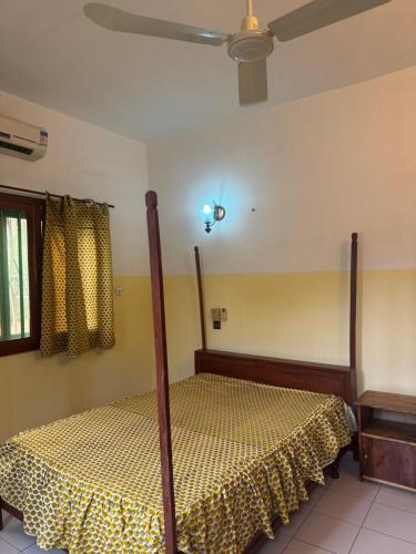 Katil atau katil-katil dalam bilik di Villa Dia Fankoué