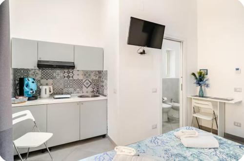 Η κουζίνα ή μικρή κουζίνα στο Duomo 34 Guest Room