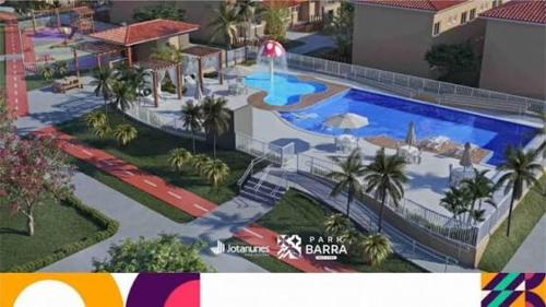 een weergave van een zwembad in een resort bij Park Barra Mais Viver in Barra dos Coqueiros