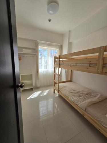 Postel nebo postele na pokoji v ubytování 2-bedroom apartment in Minesview