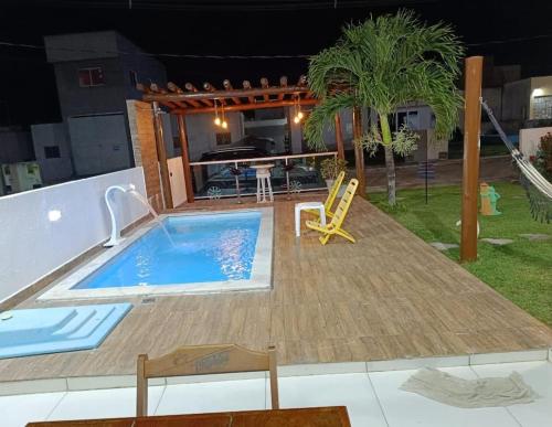 Der Swimmingpool an oder in der Nähe von Brisas Beach casa 05