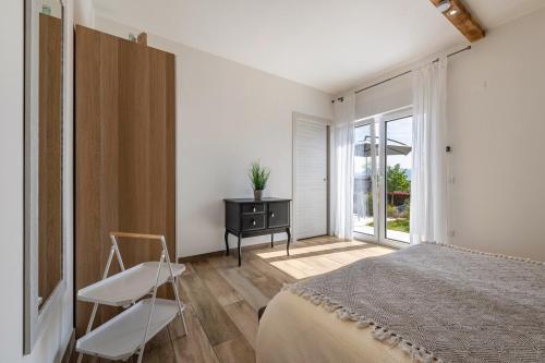 Ένα ή περισσότερα κρεβάτια σε δωμάτιο στο Ai Colli country view apartment