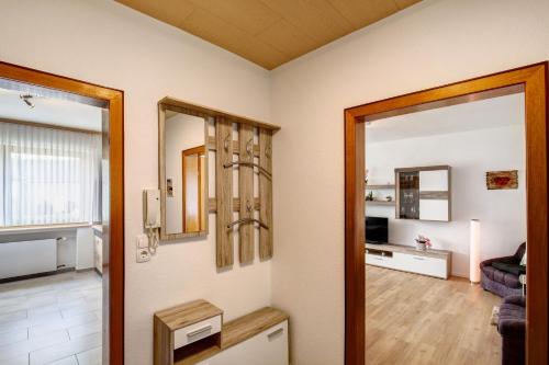 a room with a door leading to a living room at Ferienwohnung Moni in Boppard
