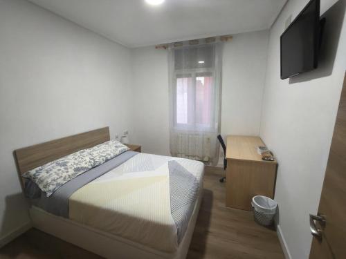 En eller flere senge i et værelse på Habitación centro Bilbao zona artística