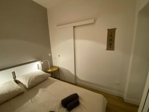 Ένα ή περισσότερα κρεβάτια σε δωμάτιο στο Château de Versailles 800m à pied