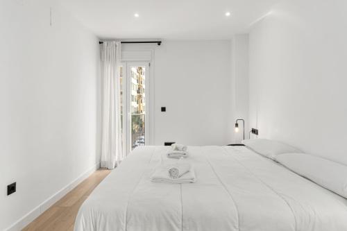 Postel nebo postele na pokoji v ubytování La Siesta 5