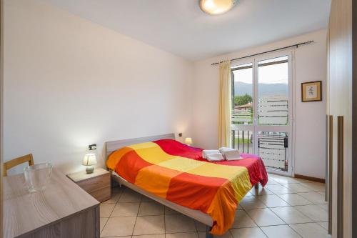 Postel nebo postele na pokoji v ubytování Residence Camelie - Mazzini 2