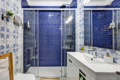 Ένα μπάνιο στο Apartamento Praia da Rocha