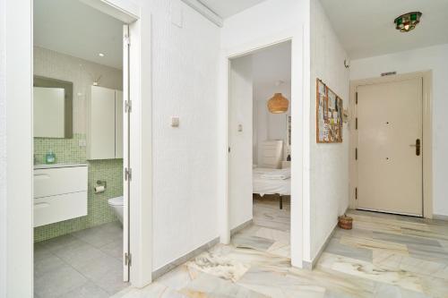 Et badeværelse på Piso con vistas increibles del mar