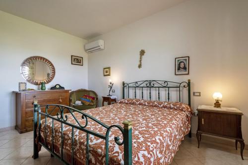 Postel nebo postele na pokoji v ubytování Villa Pitti