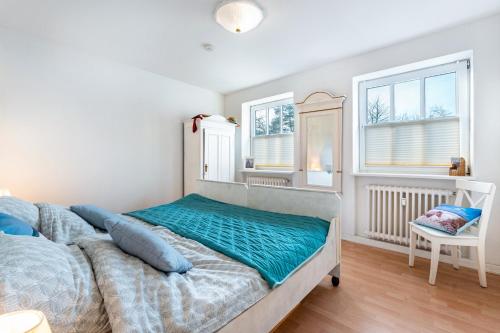 Katil atau katil-katil dalam bilik di Fewo Luv und Lee am Schulensee