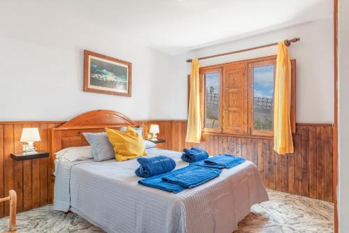 Postel nebo postele na pokoji v ubytování Andres House, Tías