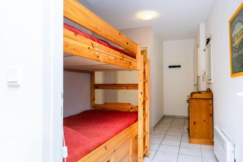 En eller flere senge i et værelse på Résidence moderne avec piscine