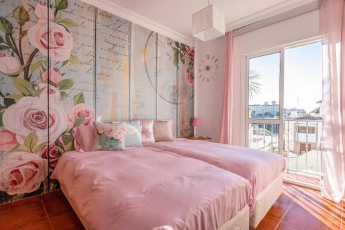 Ένα ή περισσότερα κρεβάτια σε δωμάτιο στο Villa Maite