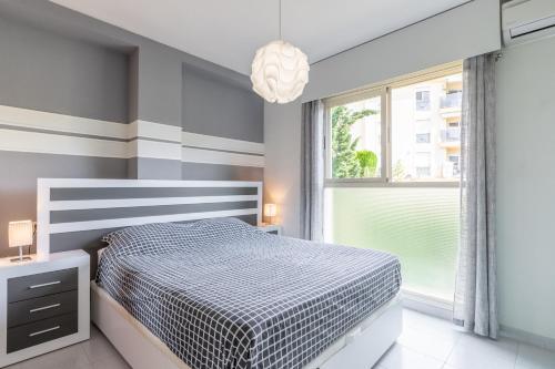 Ένα ή περισσότερα κρεβάτια σε δωμάτιο στο Apartment Zeus