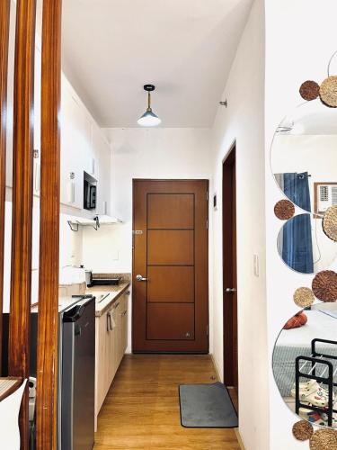 Kuchyň nebo kuchyňský kout v ubytování Chic Studio in Mesatierra