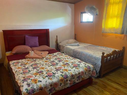 Ένα ή περισσότερα κρεβάτια σε δωμάτιο στο Hotel bulaba