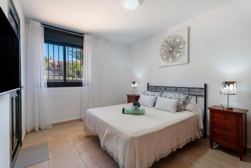 Ένα ή περισσότερα κρεβάτια σε δωμάτιο στο Apartamento Los Geranios