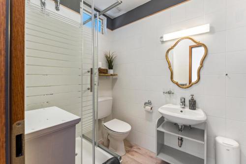 Ένα μπάνιο στο Kajüthus Apartment 2