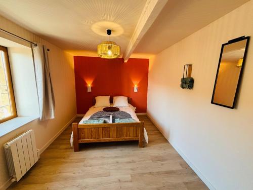 Postel nebo postele na pokoji v ubytování Gite de Clairette et Nono