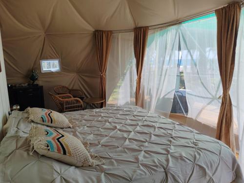 Ένα ή περισσότερα κρεβάτια σε δωμάτιο στο Front beach luxurious Dome