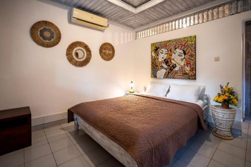 Giường trong phòng chung tại Ganesh Lodge