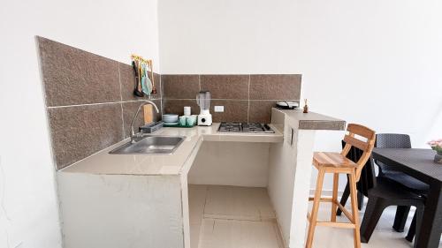 Η κουζίνα ή μικρή κουζίνα στο Cabaña Datalu 1