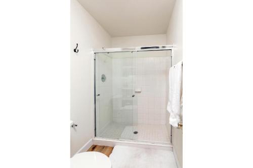 a bathroom with a shower with a glass door at Western Hills-Heated Pool-In Fountain Hills in Fountain Hills