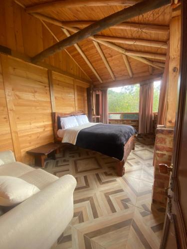 Postel nebo postele na pokoji v ubytování Amadeus Chalet Guatavita