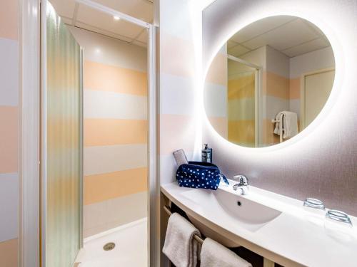 Koupelna v ubytování ibis Styles Rennes Cesson