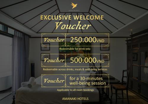 a bedroom with a sign that reads exclusive welcome provider at Amanaki Thao Dien in Ho Chi Minh City