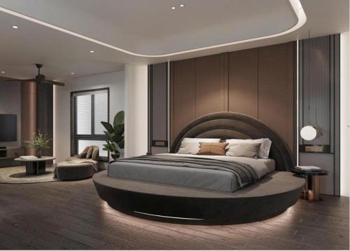 Postel nebo postele na pokoji v ubytování Chi House Danang Hotel and Apartment