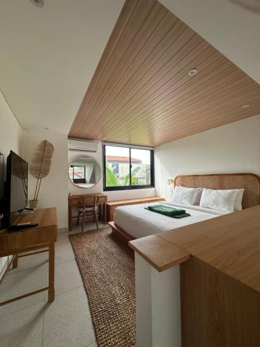 Giường trong phòng chung tại Karra Loft U1