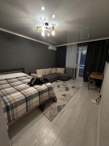 En eller flere senger på et rom på Apartament