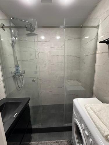 Vonios kambarys apgyvendinimo įstaigoje Apartament