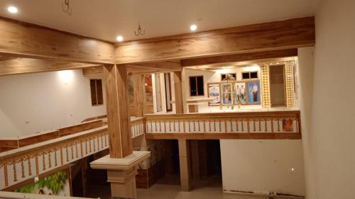 a large room with a staircase in a house at RKVilla in Tirupati