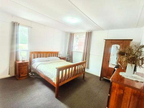 Katil atau katil-katil dalam bilik di Waterfront Christian's Minde Jervis bay